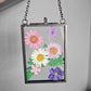 "mini" vintage style black frame with pressed pink, purple and white flowers , daisy