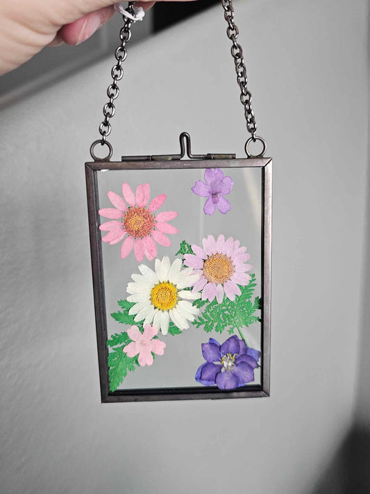 "mini" vintage style black frame with pressed pink, purple and white flowers , daisy