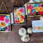 "mini" pressed flower frame, colorful collection, mix of bright blue, pink, red, orange