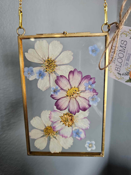 Vintage style gold frame with pressed pink, white, purple and blue flowers (cosmos and forget-me-nots)